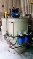 Clear water tank equipped with a blower